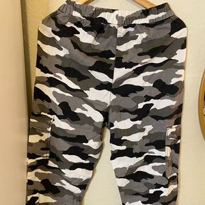 colors white black gray bags on the sides has elastic at the waist